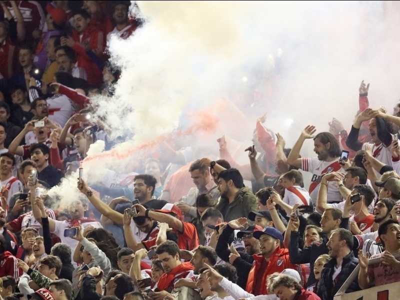 Cheer on a Local Team at a Football Match